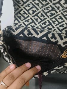New Tagged Sling Bag  With A Coin Pouch