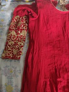 a good conditioned red embroidered gown or frock s