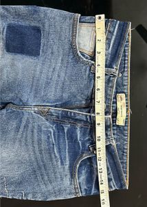 Distressed Patch Jeans