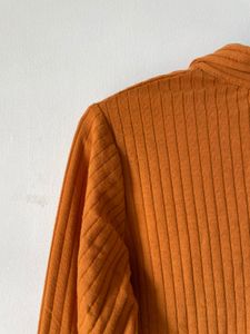 mustard brown top