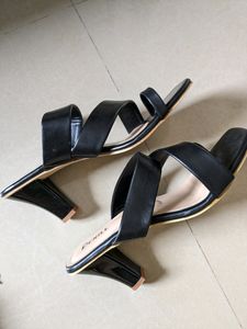 Never used Heels. Selling Because Of Size