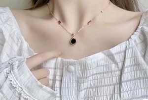 Reversible Roman Charm Necklace