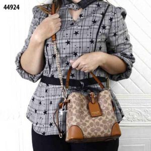 Sold 2 BUCKET BAG Of COACH