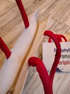 It Is A Tote Bag With Chain