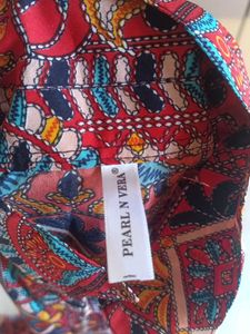 Patterned Sleeveless Jumpsuit with Belt