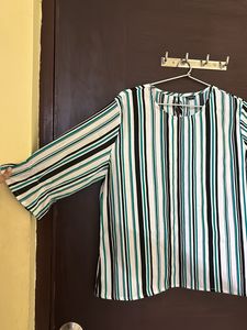 A Multi-coloured striped top.