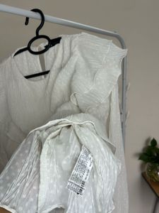 White Ruffle Blouse