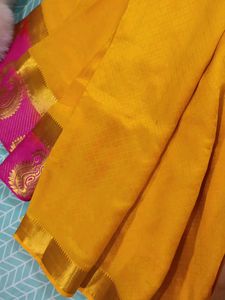 Yellow Saree With Pink Border