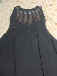 Long Black Gown With Some Design On Neck