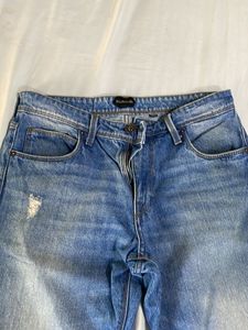 Distressed blue Denim Jeans