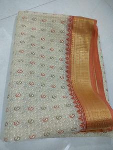 Elegant Cream & Gold Saree