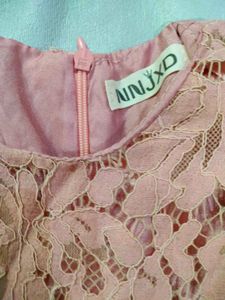 A Used Baby Girl Peach Color Frock