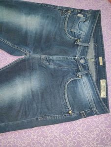 Classic Slim Fit Blue Denim Jeans.