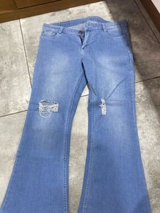 Ripped Flare Leg Jeans