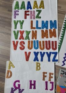 Alphabet Stickers, Feather ,crayons And Erasers