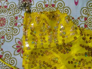 Yellow Embroidered Sequin Work Net Lehenga