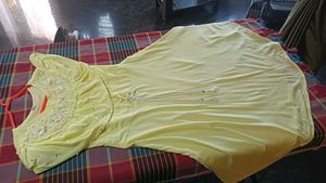 Yellow Dress With Peral Design