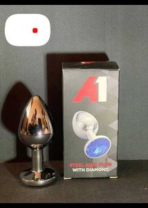 Metal Plug With Pink Diamond