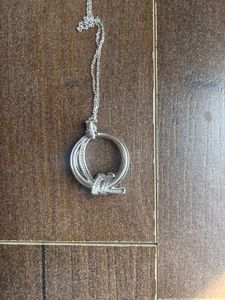 Elegant Silver Knot Pendant/new