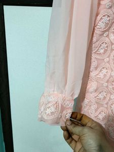 This pink colored georgette Plazo Suit