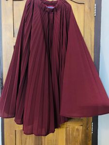 Pleated Maroon full skirt.