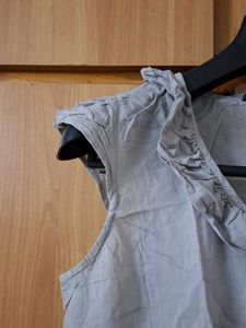 Ruffled Sleeveless Top
