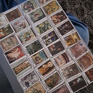 32 Vintage AJMAN painting stamps.
