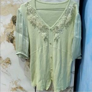 mint green knit top with embroidery