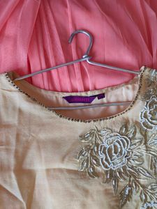 Srishti Peachy Golden Gown