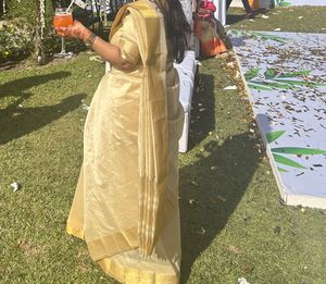 Elegant Gold Tone Saree