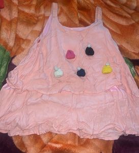 Cute Pink Dress with Pom Poms
