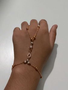 Hand Bracelet With Cute Design In Gold Colour