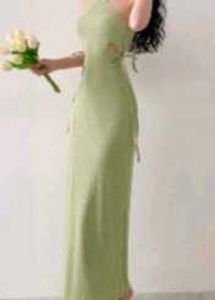 Green halterneck dress