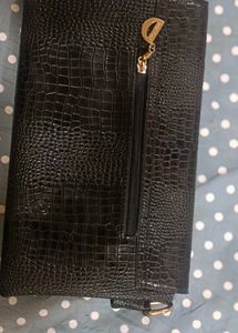 Black Clutch with Gold Accents