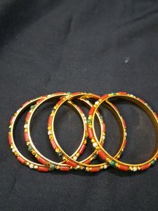 Beautiful coral and gold bangles Sz 2.8