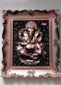 Divine Ganesha Idol in Ornate Frame