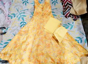 Beautiful Yellow Ethnic Gown With Red N Orange