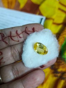 A yellow sapphire, also known as Pukhraj (पुखराज)