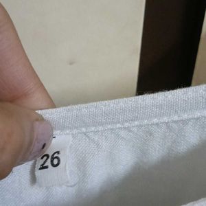 white chikankari kurti with green embroidery