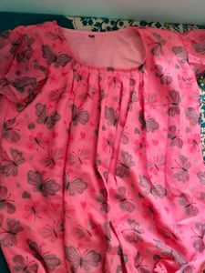 This Is A Top With Floral Print.