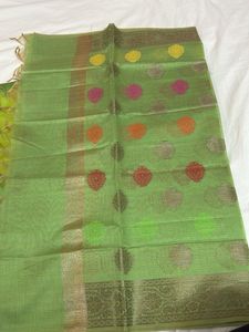 Green banarasi zari suit.