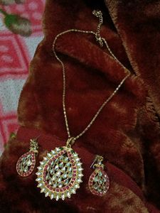 It's A Unused New Necklace With Earrings