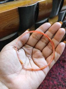 black and orange bangle set
