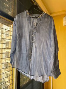 loose fit resort shirt with shell detail