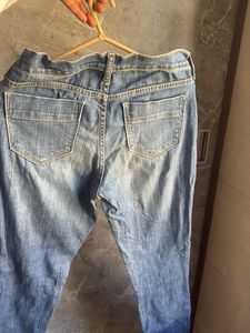 Distressed Denim Jeans