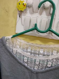 Chic Grey V-Neck Sweater with Delicate Lace Detail