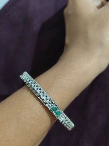 Stylish Silver Bangle with Stone Accents