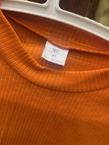 Orange Ribbed Long Sleeve Top