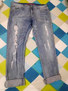 Distressed Denim Jeans