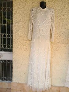 Pure White fully beaded Gown